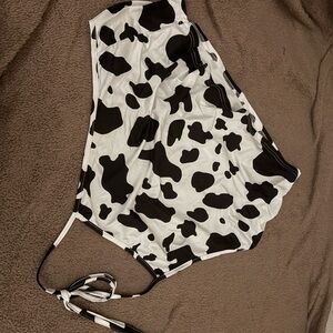 Women’s Black and White Cow Print halter top.